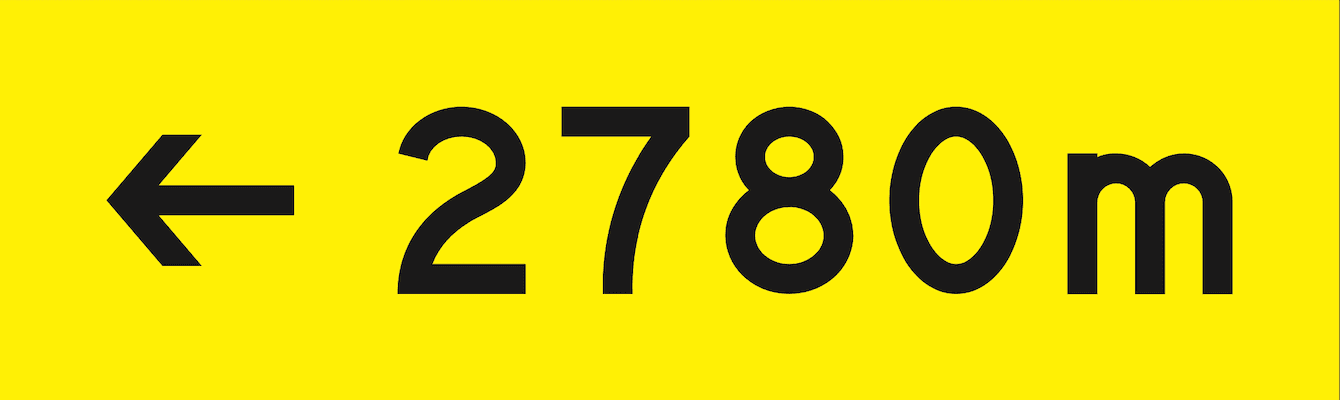 The current design: black legend on a yellow panel reading “← 2780m”.